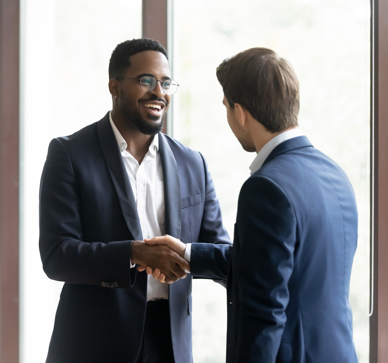 insurance brokers shaking hands